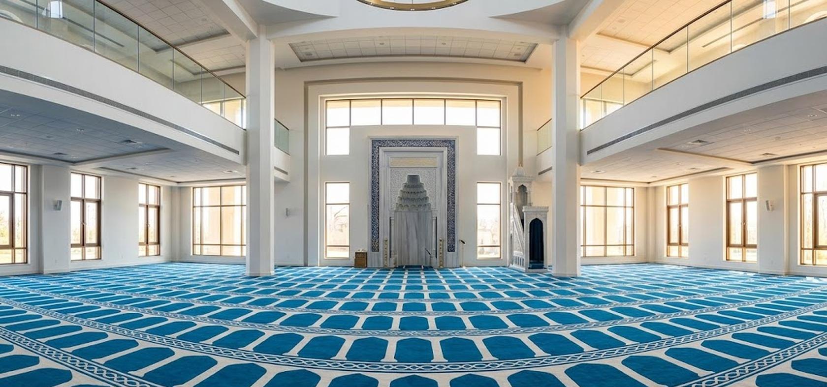 Bright mosque prayer hall with a made-to-measure carpet
